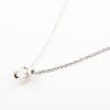 Colgante de Oro Blanco en garras con Diamante talla Brillante 0,04cts.